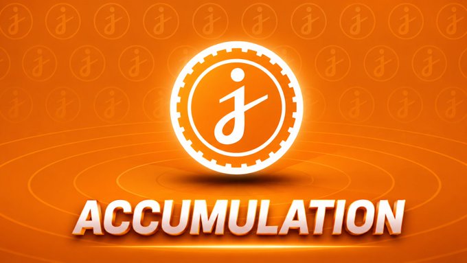 The image features a logo for a coin called "JASMY" with an orange circle containing a white "J" inside, surrounded by smaller circles of varying sizes. The text "accumulation" is written below the logo, which suggests that this coin is associated with accumulating wealth or value over time. The phrase "focus on what is in the image and how it relates to the post" implies that the purpose of the JASMY coin is to encourage people to focus on their long-term financial goals rather than seeking immediate gains from short-term investments, as they accumulate wealth through patience and discipline.