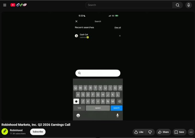 A screenshot from a YouTube video of "Robinhood Markets, Inc. Q2 2026 Earnings Call" showing a phone screen with a recent search for "Cash Cat" ($CASHCAT). The image supports the post's joke about holding the only coin mentioned on a Robinhood earnings call by displaying the search history for the ticker.