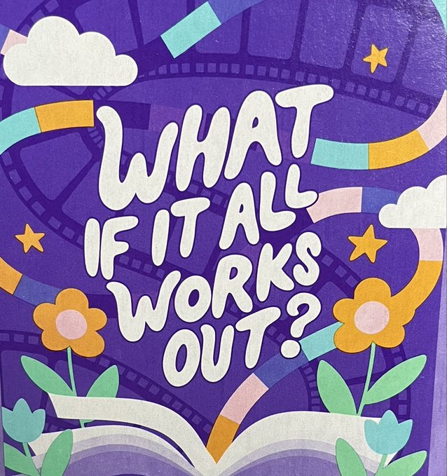 A vibrant purple illustration features an open book with flowers blooming from its pages, film strips, stars, clouds, and colorful rainbow arcs, with the bold white text "WHAT IF IT ALL WORKS OUT?" displayed prominently in the center. The whimsical, optimistic design complements the post's hopeful speculation about XRP's potential success, visually framing the question as a dreamy "what if" scenario.