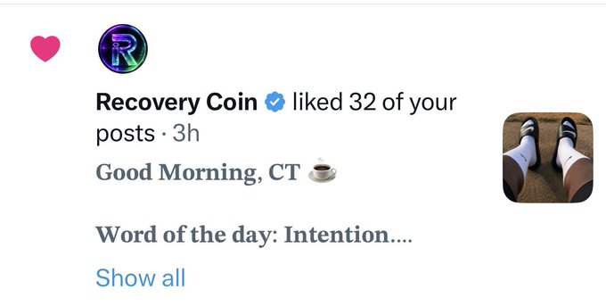 A screenshot of a notification from verified "Recovery Coin" (@Rcvrycoin) indicating they liked 32 of the user's posts, with a preview showing "Good Morning, CT ☕" and "Word of the day: Intention...." alongside a photo of feet in slides. The caption suggests the user is celebrating receiving an unusual batch of likes from Recovery Coin, interpreting the mass engagement as a sign of earned respect from a crypto community friend.