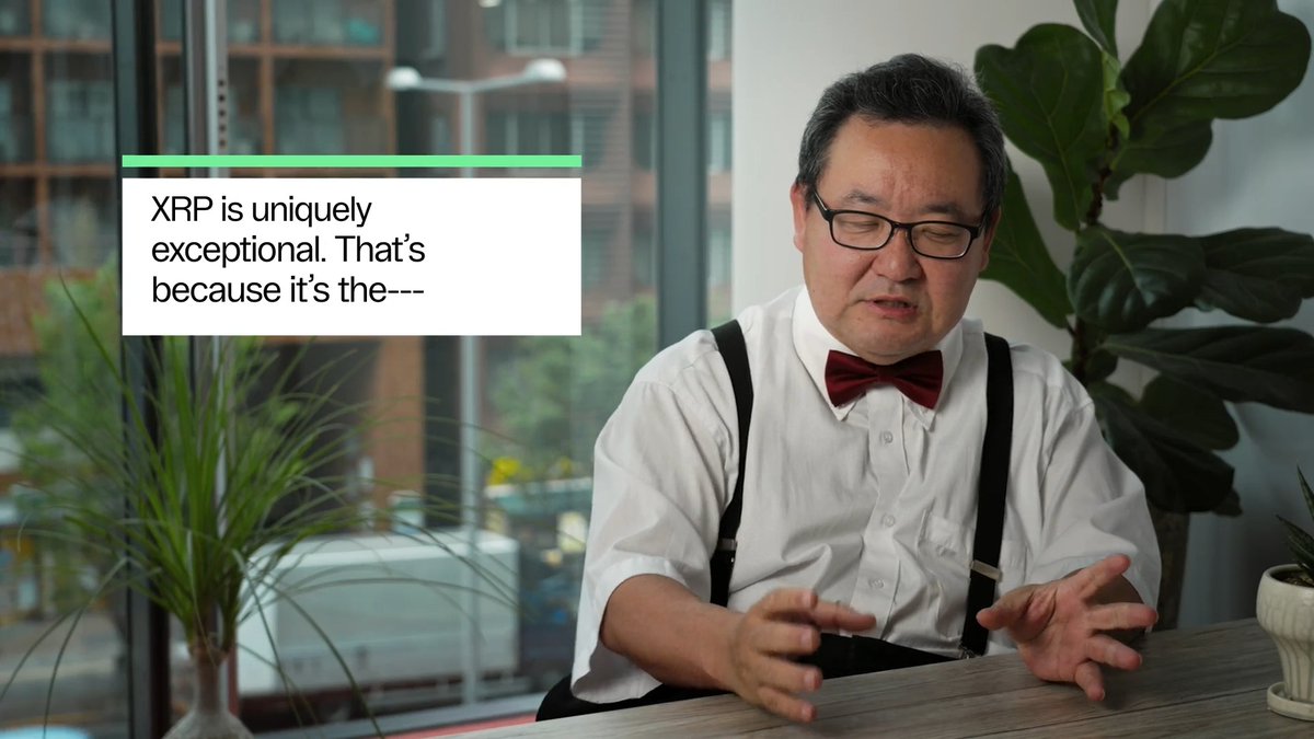A man wearing glasses, a red bow tie, and suspenders sits at a table gesturing with his hands, with a caption reading "XRP is uniquely exceptional. That's because it's the—" linking to a post about accelerating supply shock and rapid repricing of XRP.