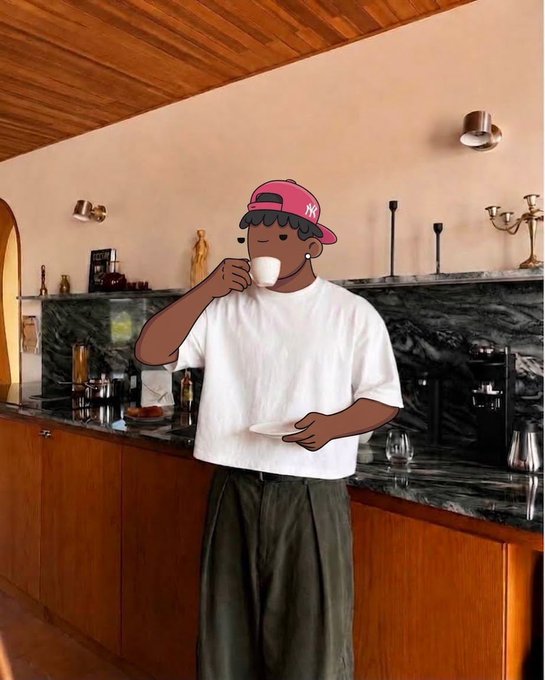 A cartoon-style illustration of a person wearing a pink NY baseball cap and white t-shirt holding a small cup is overlaid on a photograph of a modern kitchen with wood ceilings, marble countertops, and wooden cabinetry.