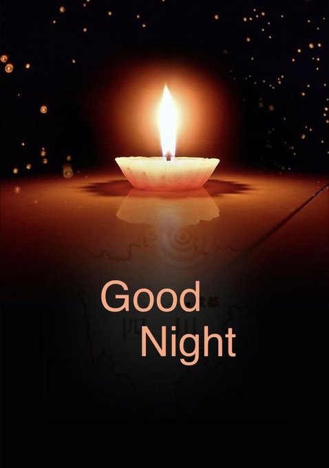A glowing candle flame in the dark with the text 'Good Night' displayed below in warm orange letters, with subtle Chinese characters in the background.