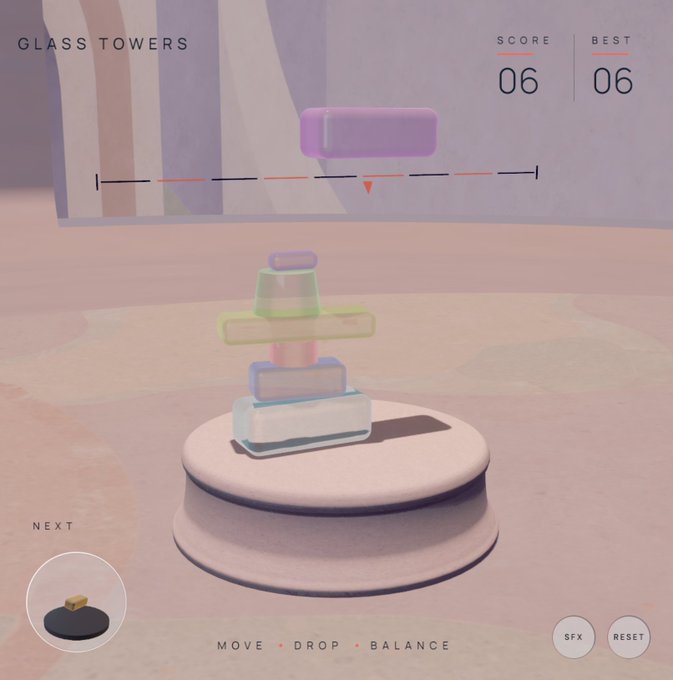 A screenshot of the minimalist puzzle game "Glass Towers" shows a score of 06 and a best of 06, with colorful translucent blocks being stacked on a rotating pedestal. The interface displays gameplay instructions "MOVE • DROP • BALANCE" along with options for "NEXT," "SFX," and "RESET," matching the developer's description of their glass-stacking creation.