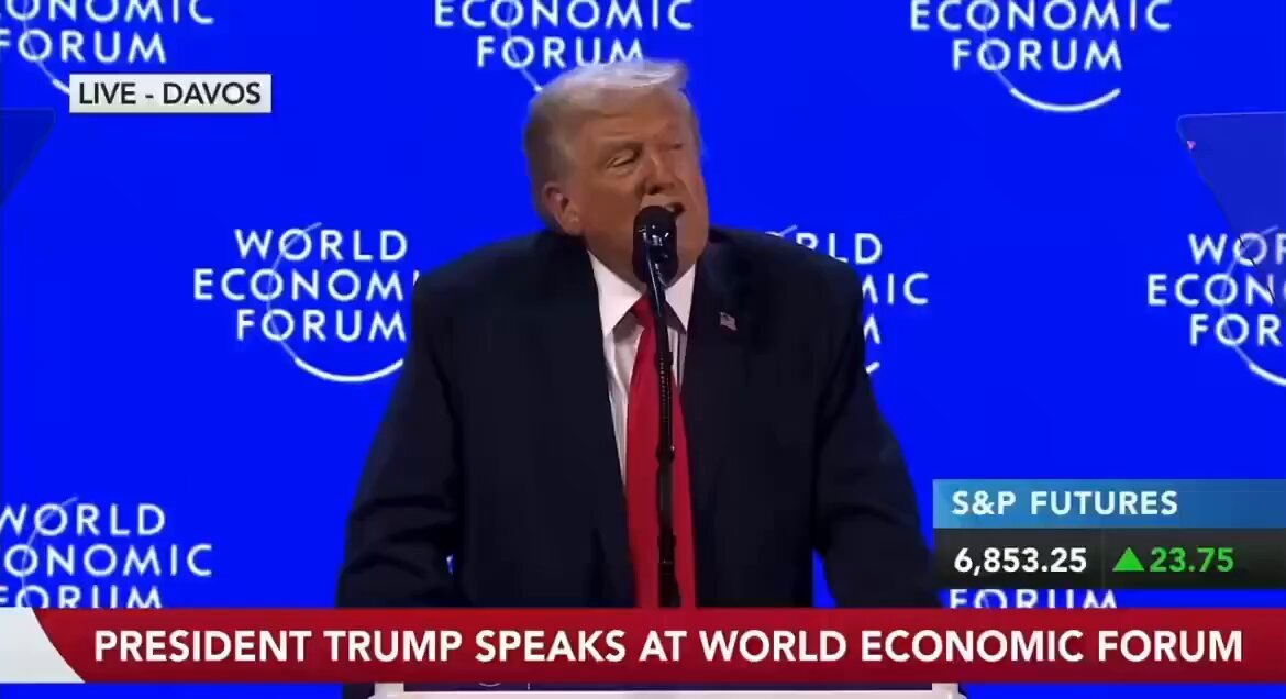 The image shows a man speaking at an event, possibly at the World Economic Forum. The man is dressed in a suit and tie, giving him a formal appearance. He appears to be addressing the audience or discussing economic matters. The background features a blue wall with logos for the World Economic Forum and the U.S. President. The text on the image reads "PRESIDENT TRUMP SAID HE EXPECTS TO SIGN THE U.S. CRYPTO MARKET STRUCTURE BILL VERY SOON. THE LEGISLATION IS EXPECTED TO PROVIDE LONG-AWAITED REGULATORY CLARITY FOR BITCOIN, CRYPTOCURRENCY EXCHANGES, AND DIGITAL ASSETS".