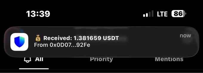 iPhone notification screenshot at 13:39 showing a cryptocurrency transaction 'Received: 1.381659 USDT From 0x0D07...92Fe' with a Trust Wallet-style shield icon.