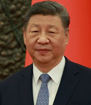 This image shows Chinese President Xi Jinping, whose leadership oversees the contrasting economic trends highlighted in the post: strong manufacturing versus weaker retail and property sectors.