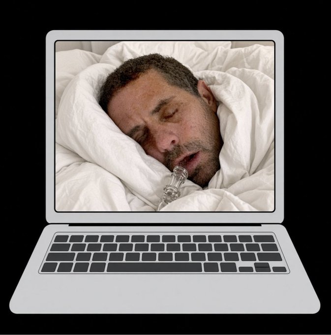 The image shows a person sleeping in a bed with white bedding, drooling and holding a crack pipe in their mouth, displayed on a laptop screen. This visually represents the "Crack Mac" laptop meme, parodying the Hunter Biden laptop story to promote the $CRACKMAC memecoin.