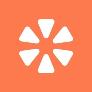The Yelp logo featuring a white flower-like burst of triangular shapes on an orange background.