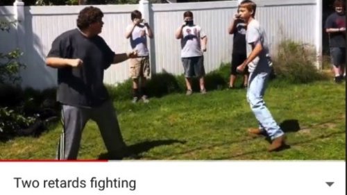 The image shows two boys in a backyard squaring off in a mock fight while three onlookers record the scene with their phones, with a caption reading "Two retards fighting." This ties to the post by visually mocking the idea of choosing sides between $PUMP and $STONK, suggesting the rivalry is pointless when one could simply hold both.