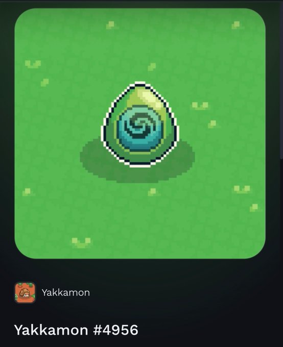 A digital profile card on a dark background displays a pixel art icon of a green and blue swirled egg in a grassy field, labeled 'Yakkamon' and 'Yakkamon #4956'.