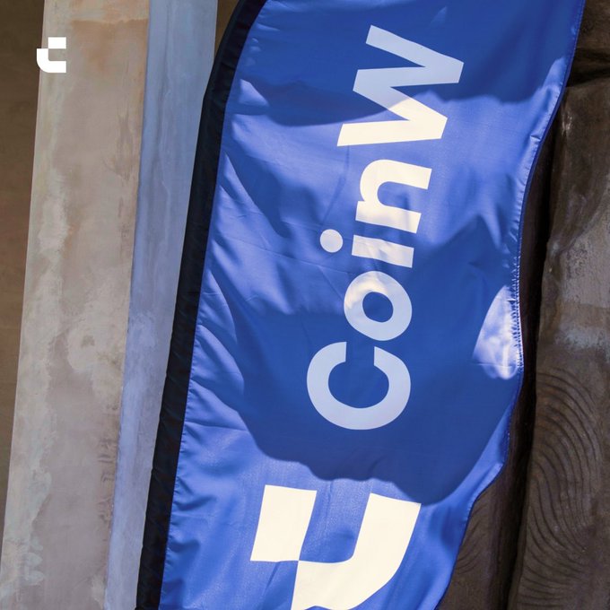 A blue fabric flag with the word 'Conviv' printed vertically in white letters.