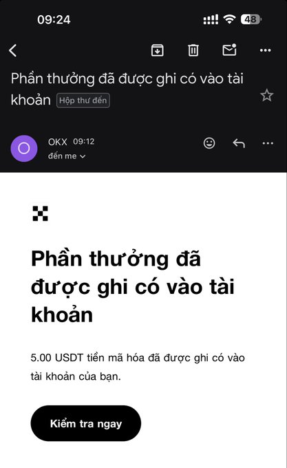 Vietnamese email notification from OKX (09:12) stating "Phần thưởng đã được ghi có vào tài khoản" (Rewards have been credited to your account), confirming 5.00 USDT crypto has been deposited.