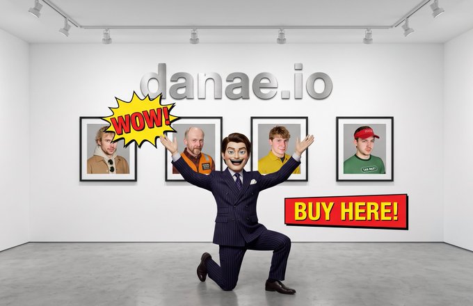 An advertisement showing a man in a pinstripe suit kneeling with arms raised in front of a wall displaying 'danae.io' and framed portraits, with 'WOW!' and 'BUY HERE!' graphic overlays.