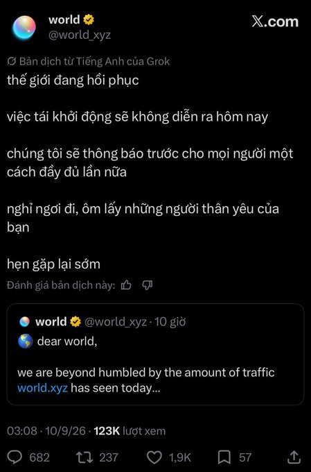 A tweet translation from @world_xyz in Vietnamese announces that the world is recovering and the relaunch won't happen today, asking followers to rest and hug their loved ones.