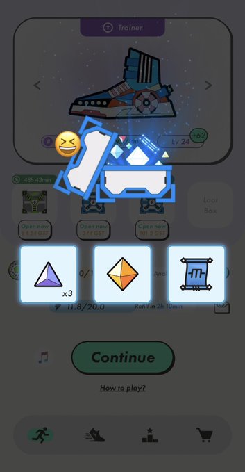 A mobile game screen showing a 'Trainer' item with various colored gems and geometric shapes, a laughing emoji, and a 'Continue' button at the bottom.
