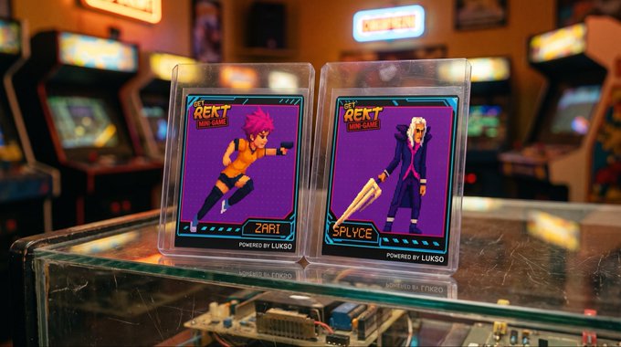 Two "Get Rekt Mini Game" collectible cards labeled "ZARI" and "SPLYCE" (Powered by LUKSO) sit on a glass surface in an arcade setting, visually representing the new $LYX-powered mechanics and Metaheads gaming features referenced in the post.