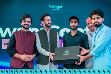 Five men pose together at a 'WSC25' event hosted by 'Bitget Academy' (Pakistan), with one man in the center holding a framed certificate or award.