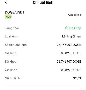 A screenshot of a Vietnamese trading app showing order details 'Chi tiết lệnh' for DOGE/USDT, marked as 'Đã khớp' (matched), with 26.746907 DOGE at 0.08973 USDT, totaling $2.39.