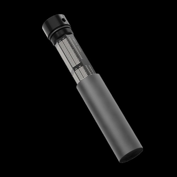 A Trezor Keep Metal seed backup device with engraved mnemonic word grids (showing words like "stream", "crush", "word", "ocean", "tornado") on a metallic cylindrical body, designed for durable offline storage of cryptocurrency wallet recovery phrases.