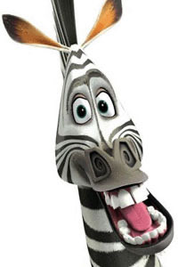 A close-up of Marty the zebra from Madagascar with a wide-eyed, goofy expression and his tongue hanging out, capturing an exaggerated "is something wrong with me?" reaction that matches the post's questioning tone. No text or logos are visible in the image.