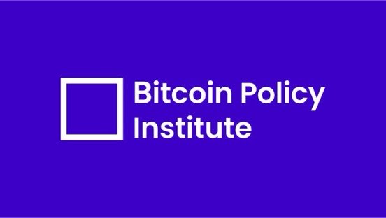 The image shows the logo of the Bitcoin Policy Institute, featuring a white square outline next to the organization's name in white text on a purple background. This logo visually identifies the institute mentioned in the post, which is participating in the U.S. Department of State's "Freedom Tech Excellence Program" to promote online free speech and counter digital surveillance.
