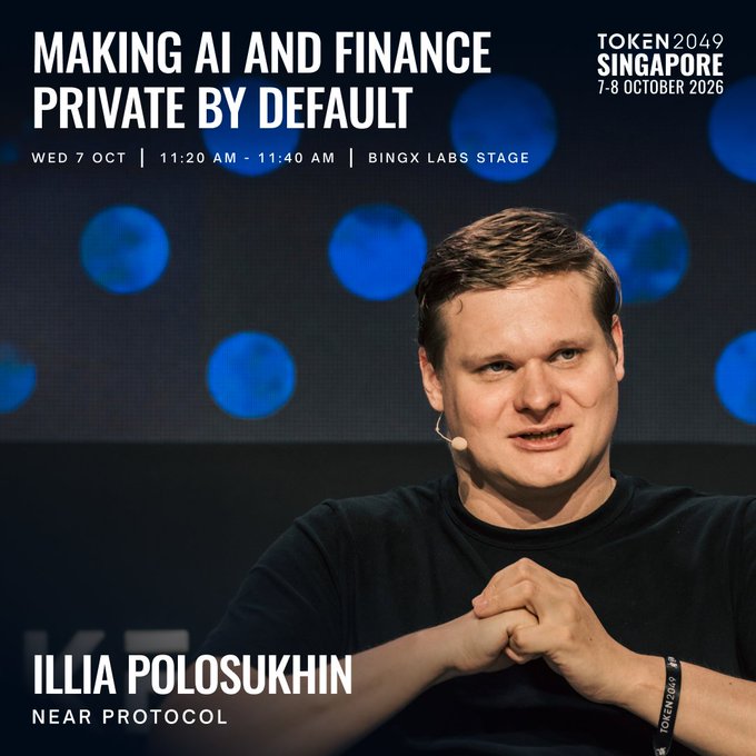 Promotional graphic for TOKEN2049 Singapore (7-8 October 2026) featuring a man with short brown hair wearing a black t-shirt and an earpiece microphone, seated against a backdrop of glowing blue circles, with text announcing his talk "Making AI and Finance Private by Default" on Wed 7 Oct from 11:20-11:40 AM at the BingX Labs Stage, identifying him as Illia Polosukhin of NEAR Protocol. The image ties directly to the post's message about NEAR's co-founder presenting how NEAR enables user-owned, encrypted AI and finance.