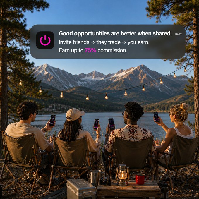 A scenic outdoor gathering of friends sitting by a lake at sunset holding up phones, with a promotional notification overlay reading 'Good opportunities are better when shared. Invite friends → they trade → you earn. Earn up to 75% commission.'