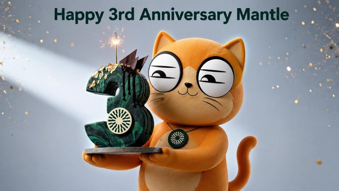 An orange cat mascot holds a cake shaped like the number 3 with a lit sparkler, accompanied by the text 'Happy 3rd Anniversary Mantle'.