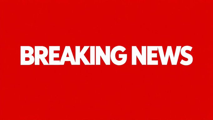 A bold red screen displaying the words 'BREAKING NEWS' in large white capital letters.