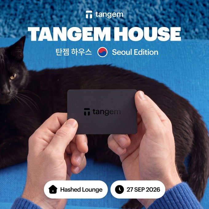 Promotional graphic for 'TANGEM HOUSE Seoul Edition' featuring the Tangem logo, a black cat lying on a blue rug, and hands holding a black Tangem card, with event details 'Hashed Lounge' and '27 SEP 2026'.