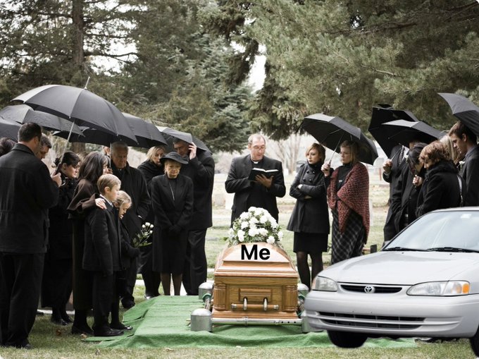A humorous image of a funeral scene with mourners holding umbrellas around a wooden casket labeled 'Me' in black text.