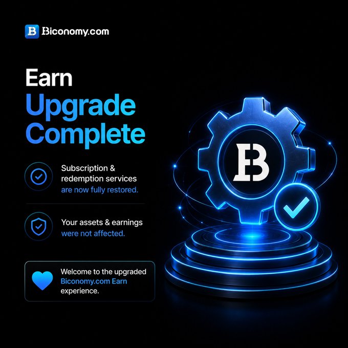 The image features a blue gear with a white logo that reads "Biconomy.com" at its center, surrounded by blue lights against a black background. The caption below the gear states that the Earn Upgrade Complete system upgrade has been completed, and the Earn assets & earnings were not affected during the upgrade.