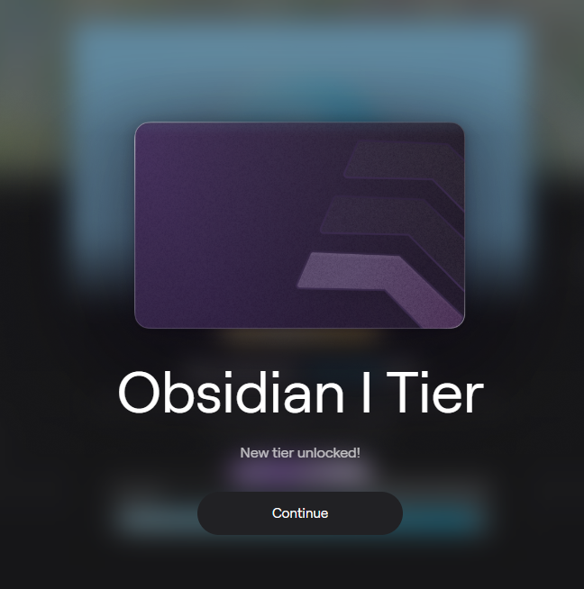 A digital tier unlock screen displaying a purple card with the text "Obsidian | Tier", "New tier unlocked!", and a "Continue" button.