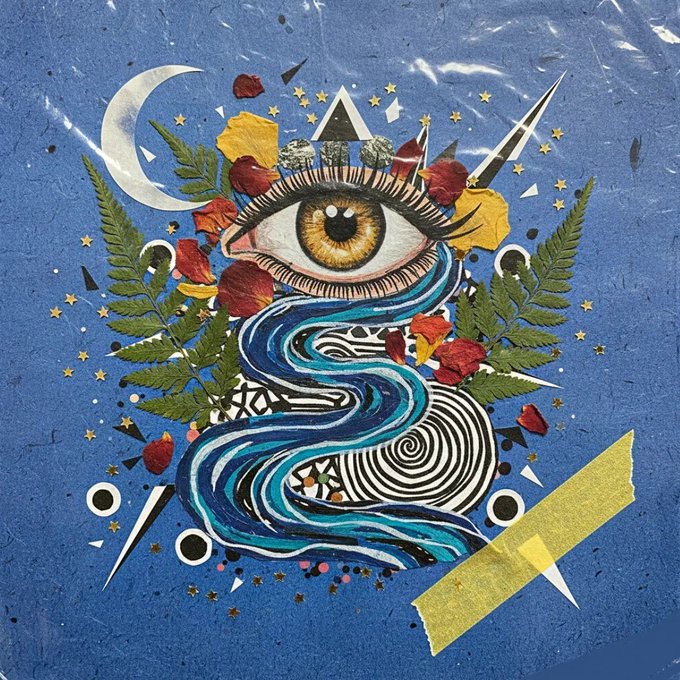 A surreal collage artwork featuring a central eye with a yellow iris, surrounded by fern leaves, scattered rose petals, stars, a crescent moon, and swirling blue water patterns on a textured blue background.