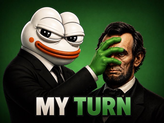 A promotional image features a fish-like character in a black suit covering a bearded man's eyes with a green-gloved hand, with the text "MY TURN" below against a green background.