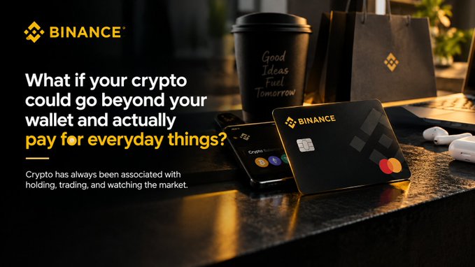 A Binance promotional banner featuring a coffee cup reading "Good Ideas Fuel Tomorrow," a Binance card, and the text "What if your crypto could go beyond your wallet and actually pay for everyday things?"