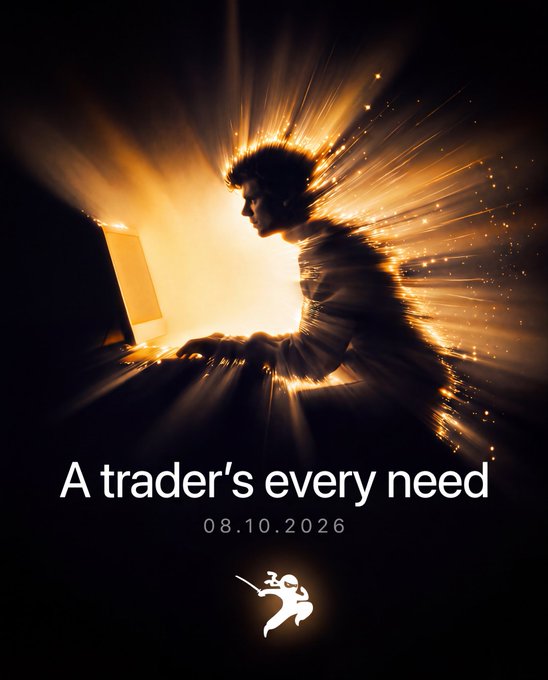 A dramatic poster showing a silhouetted figure typing on a laptop with golden light bursting outward, captioned 'A trader's every need' with the date '08.10.2026' and a small angel logo.