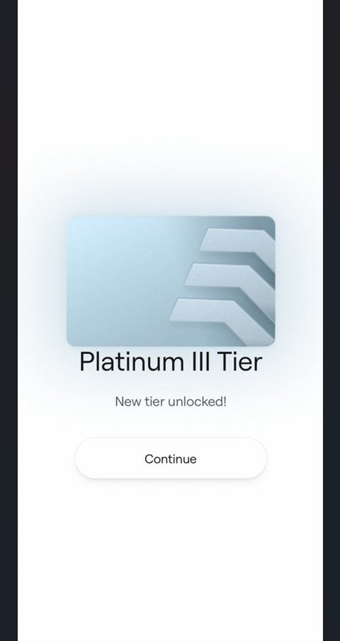 A digital reward screen displaying a Platinum III Tier card with 'New tier unlocked!' message and a 'Continue' button on a clean white background.