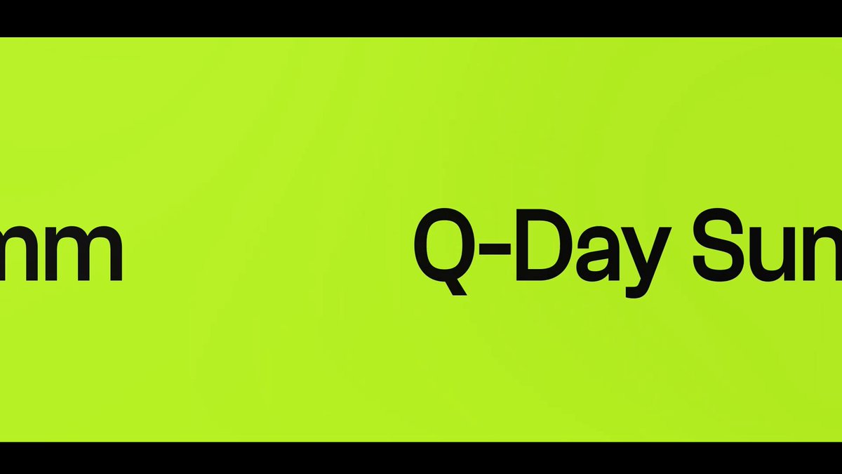 The image features a green banner that reads "mm" with the word "Q-Day" written below it, which suggests an event or gathering related to Q-Day. The text also mentions that the post is about Q-Day, indicating that it's likely related to the Q-Day event.