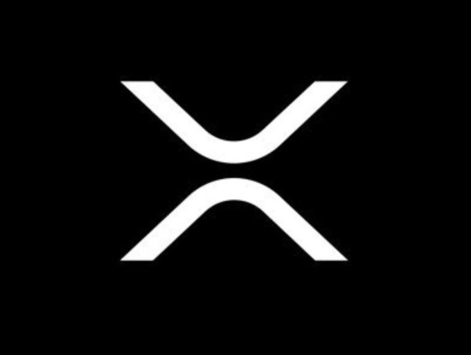 The white XRP logo on a black background.