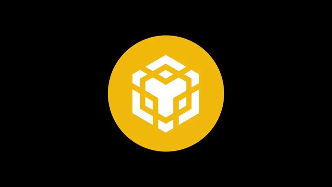 The Binance logo, a yellow circle containing a stylized white geometric 'B' symbol, displayed on a dark background.