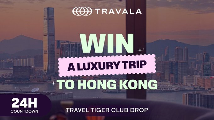 A promotional banner for Travala featuring a Hong Kong skyline at sunset, with text reading 'WIN A LUXURY TRIP TO HONG KONG', '24H COUNTDOWN', and 'TRAVEL TIGER CLUB DROP'.