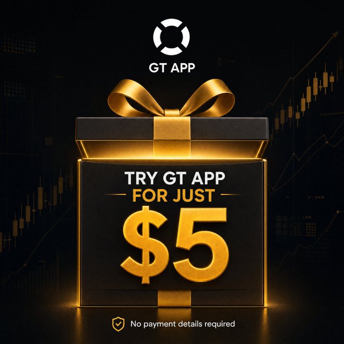 A promotional graphic for GT APP features a black gift box with a gold ribbon and bow against a dark background with candlestick charts, displaying the text "TRY GT APP FOR JUST $5" along with a "No payment details required" badge. The image visually reinforces the offer to access the app's full suite of trading tools—including AI backtesting and automated strategies—for a low-cost trial.