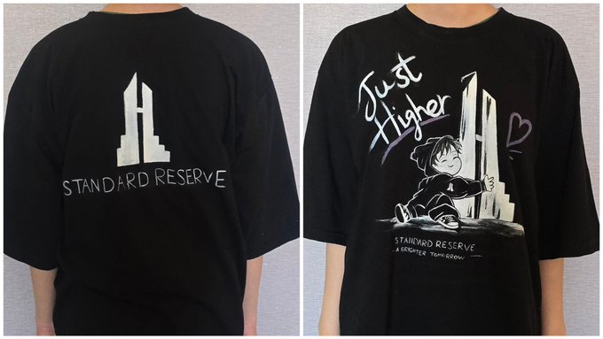 Two views of a black t-shirt: the back displays a building logo with 'STANDARD RESERVE' text, while the front features the text 'Just Higher' with a cartoon character and 'STANDARD RESERVE A BETTER TOMORROW'.