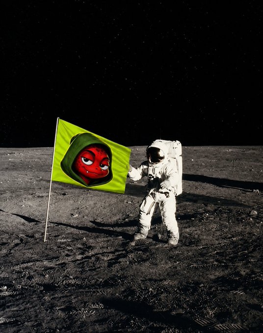 An astronaut on the moon's surface plants a vibrant flag featuring a red cat face with a green hood, symbolizing Cash Cat ("CashCat") staking its claim as the pioneering meme token of the RH chain and leading the charge into the upcoming second wave of explosive momentum.