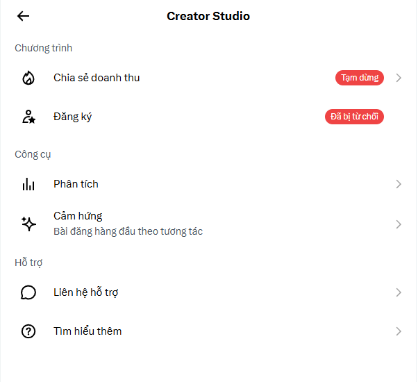 The image displays a TikTok Creator Studio menu in Vietnamese, showing options like "Chia sẻ doanh thu" (Revenue Sharing) marked as "Tạm dừng" (Paused) and "Đăng ký" (Subscription) marked as "Đã bị từ chối" (Rejected), along with Analytics and Support tools.

This relates to the post as the user is sharing their Creator Studio dashboard to show off or flex their account features, despite the revenue sharing being paused and their subscription application being rejected—fitting the self-deprecating humor about following the trend of showing off creator accounts.