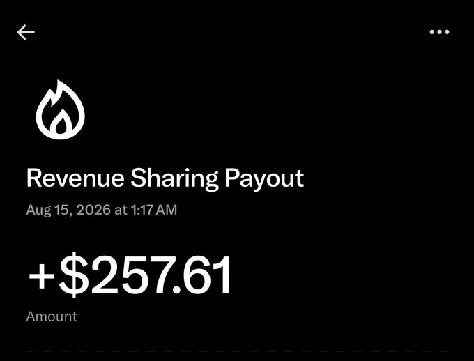 A screenshot of an X (formerly Twitter) revenue sharing payout notification dated August 15, 2026, showing an amount of +$257.61 next to the platform's flame logo, illustrating the creator's first earnings from the platform's monetization program.