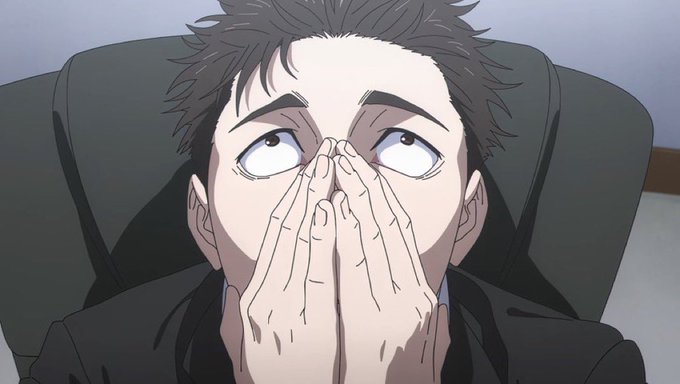 An anime character in a suit covers his mouth with both hands while looking upward.
