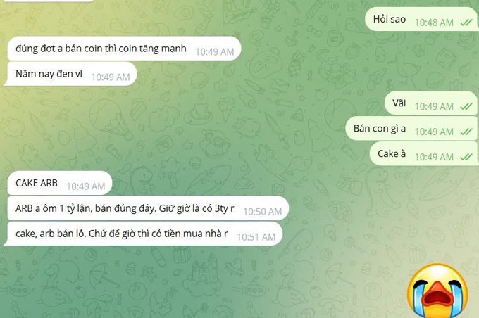 A Telegram chat conversation in Vietnamese about cryptocurrency (ARB/coin) is shown on a green background with a crying emoji in the corner.